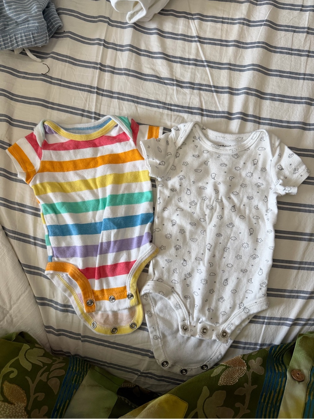 4 Carter's NB Onesies - Rainbow Stripe, blue stripe and White Cloud Prints